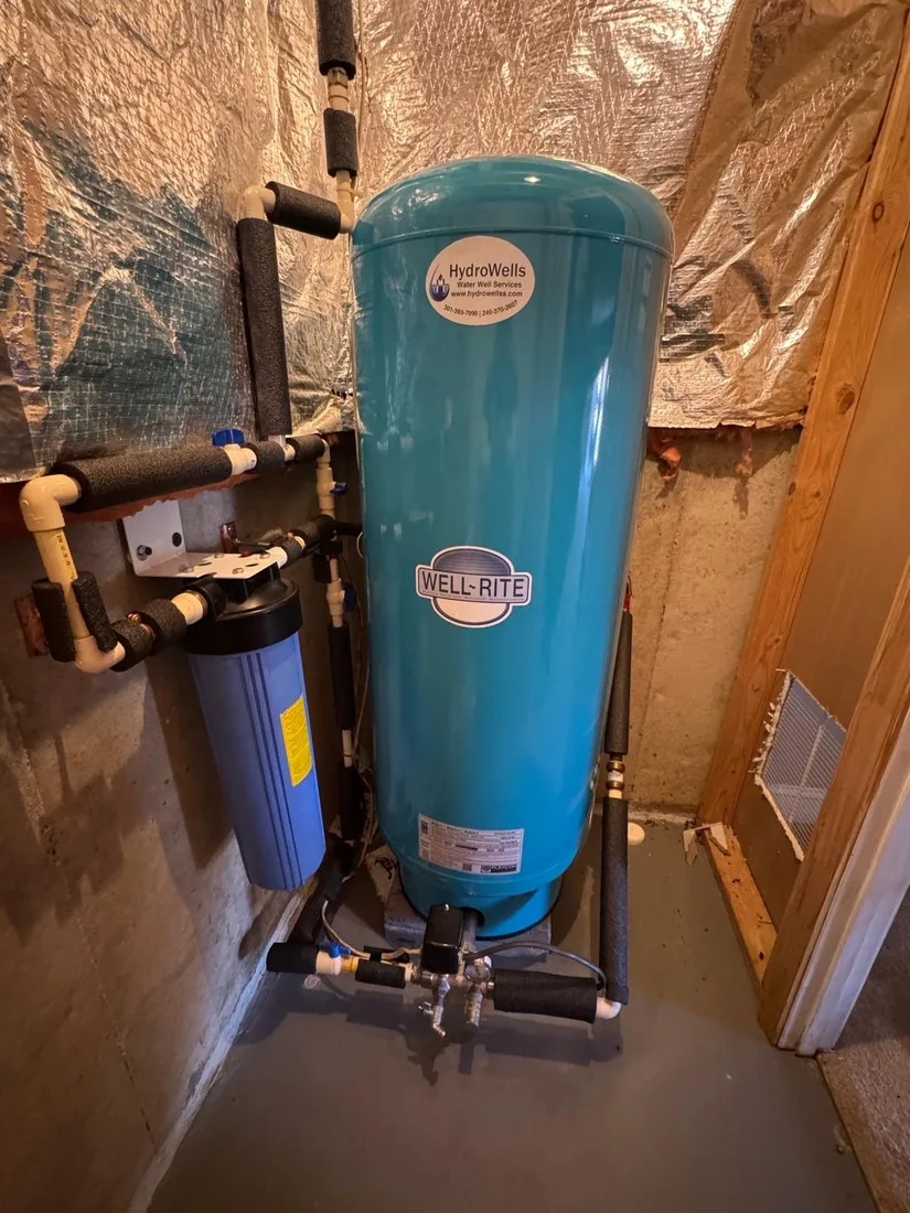 New well pressure tank installed and plumbed in a Maryland basement