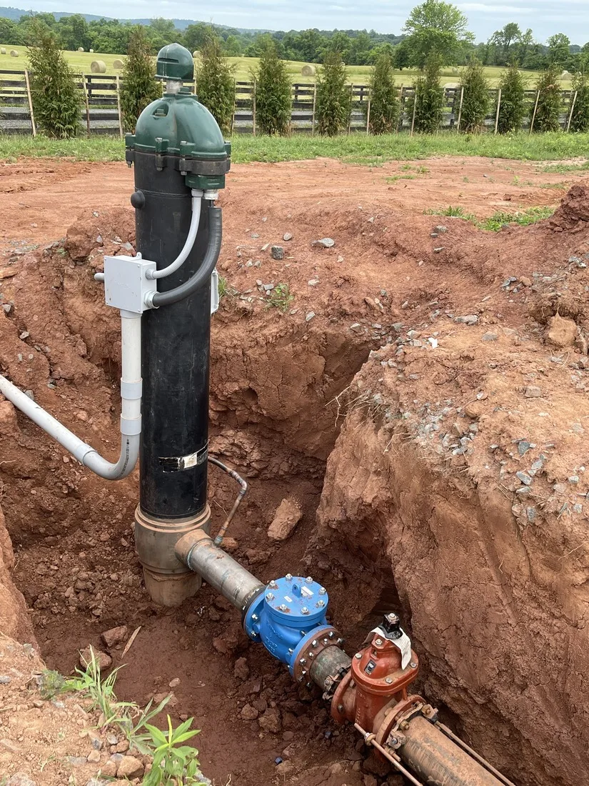 Well water line and valve connections at the wellhead
